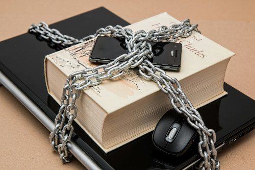 A computer secured with a long chain