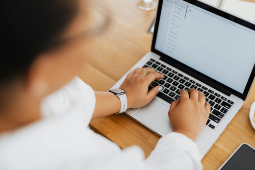 A lady reading a phishing email