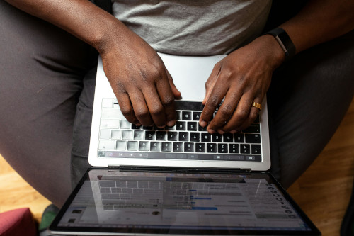 Man copyediting a document