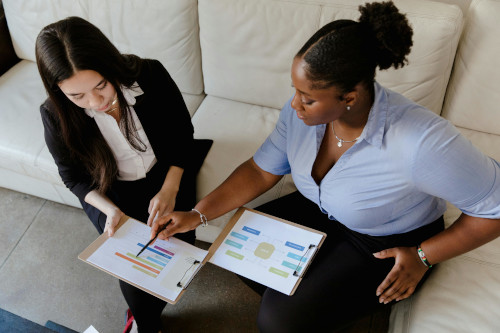Ladies discussing copyediting vs proof reading